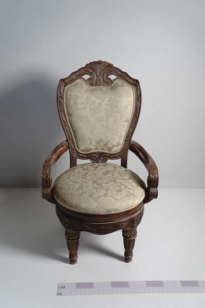 Antique upholstered armchair